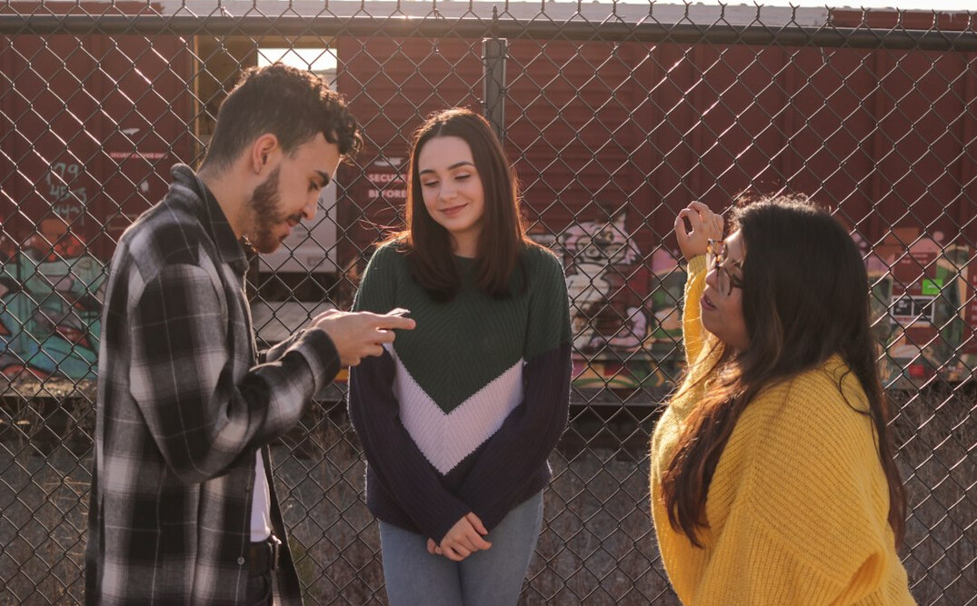 teenagers discussing ideas in group